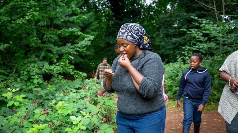 A family exploring the grounds at Fyne Court, Somerset